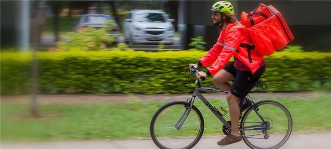 Entregador com bicicleta em São Paulo