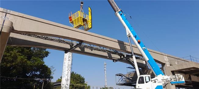 Instalação do carrinho de medições na obra do mono