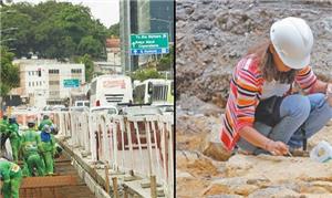 Operários preparam a pista na Rua Equador para col